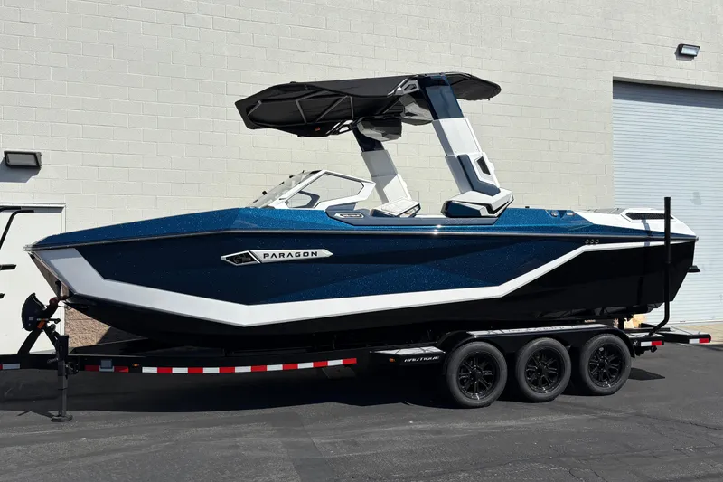 The Image of 2026 Nautique Super Air Nautique G25 Paragon boat on trailer, side view. - 0