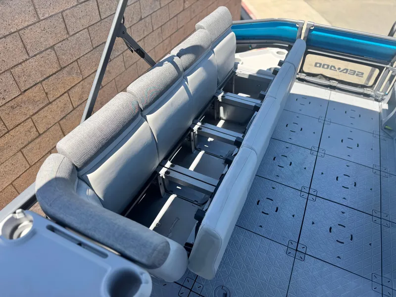 Slide: The Image of 2023 Sea-Doo Switch Cruise 21 interior seating with adjustable backrests and modular floor design. - 11