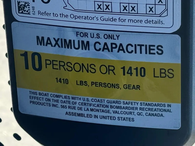 Slide: The Image of 2023 Sea-Doo Switch Cruise 21 capacity label: 10 persons or 1410 lbs. - 27