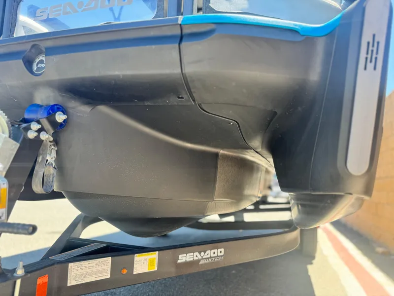Slide: The Image of 2023 Sea-Doo Switch Cruise 21 hull on trailer, close-up view. - 4