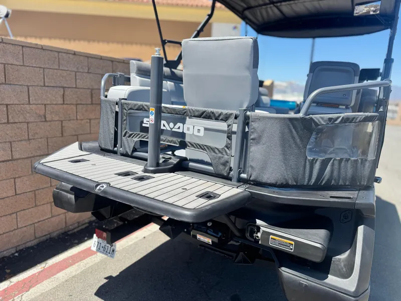 Slide: The Image of 2023 Sea-Doo Switch Cruise 21 rear view, showcasing deck and seating area. - 7