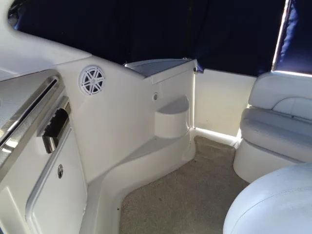 Slide: The Image of Interior of 2003 Regal Commodore 3860 boat, featuring seating and storage compartments. - 15