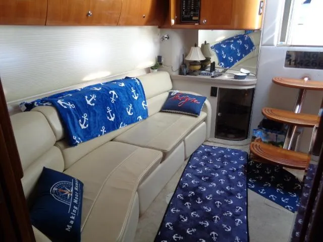 Slide: The Image of Luxurious interior of 2003 Regal Commodore 3860 yacht with nautical-themed decor. - 19