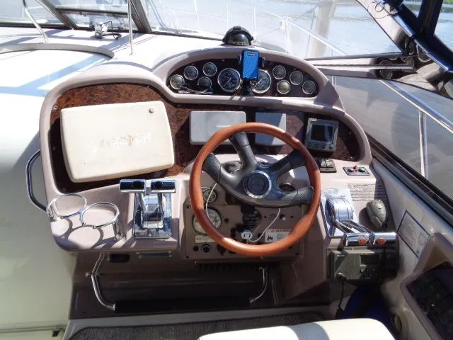 Slide: The Image of Cockpit of 2003 Regal Commodore 3860 with steering wheel and control panel. - 7