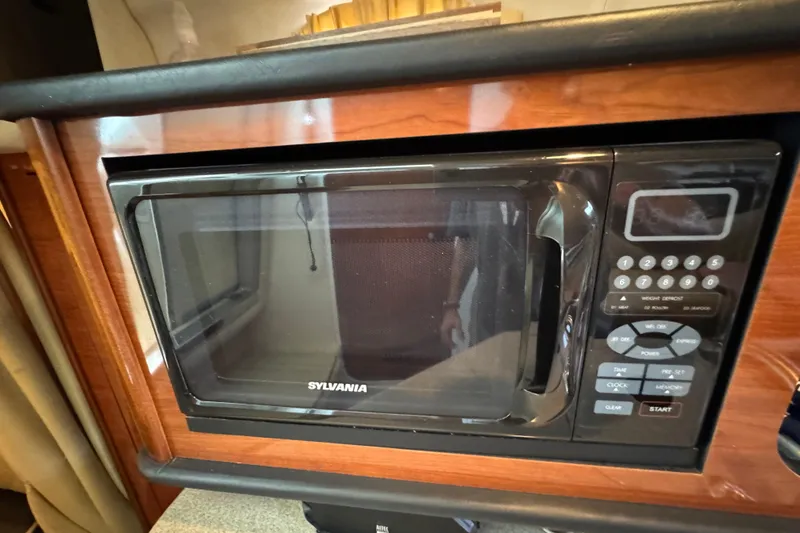 Slide: The Image of Sylvania microwave in 2006 Sea Ray 260 Sundancer boat kitchen. - 31