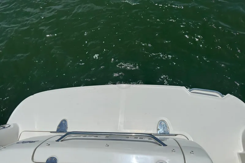 Slide: The Image of Rear view of 2006 Sea Ray 260 Sundancer boat on water. - 37