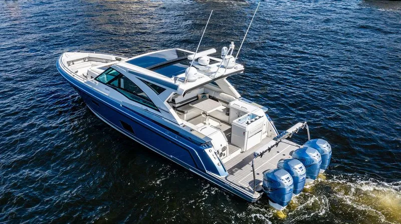 Slide: The Image of 2019 Formula 430 All Sport Crossover boat cruising on open water. - 12