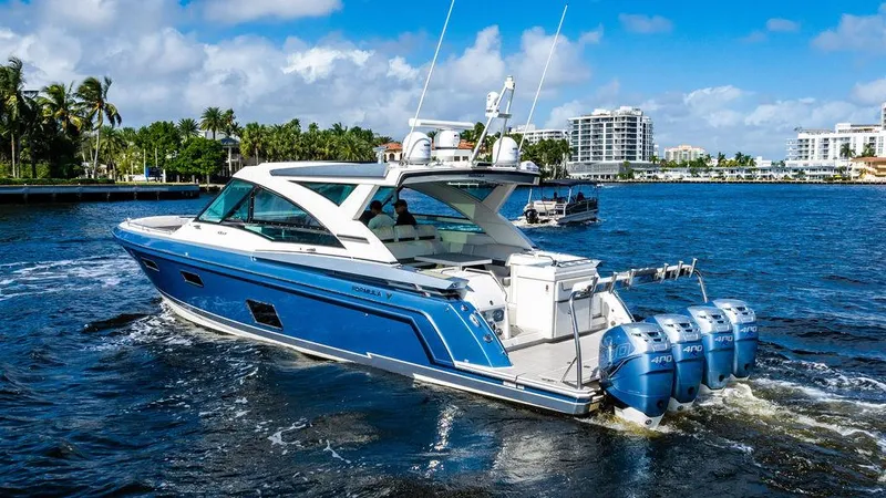 Slide: The Image of 2019 Formula 430 All Sport Crossover boat cruising on a sunny day. - 14