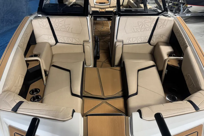 Slide: The Image of Luxurious interior of 2026 Nautique Super Air Nautique G25 Paragon boat. - 16