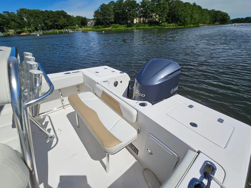 Slide: The Image of 2016 Edgewater 228CC boat with Yamaha 250 engine on a scenic lake. - 18