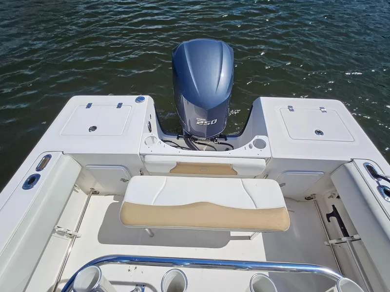 Slide: The Image of 2016 Edgewater 228CC boat with Yamaha 250 engine on water. - 19