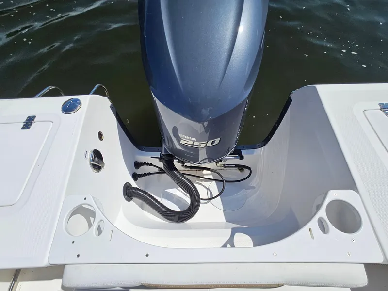 Slide: The Image of Edgewater 228CC boat with Yamaha 250 engine, 2016 model, on water. - 21