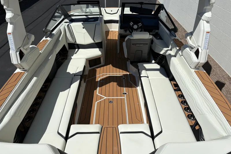 Slide: The Image of 2026 Nautique Super Air Nautique G25 interior with luxurious seating and sleek design. - 8