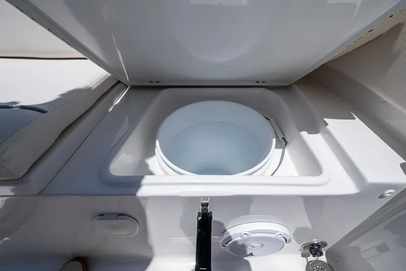 Slide: The Image of Livewell compartment on 2024 Sea Hunt Ultra 239 SE boat. - 14