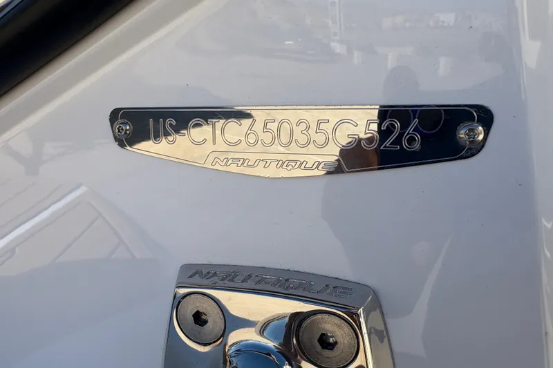 Slide: The Image of 2026 Nautique Super Air Nautique G25 hull identification plate close-up. - 18