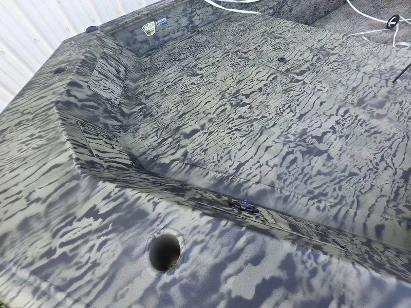 Slide: The Image of 2026 Tracker Grizzly® 1650 T Prairie Wings Edition boat with camouflage pattern interior. - 17