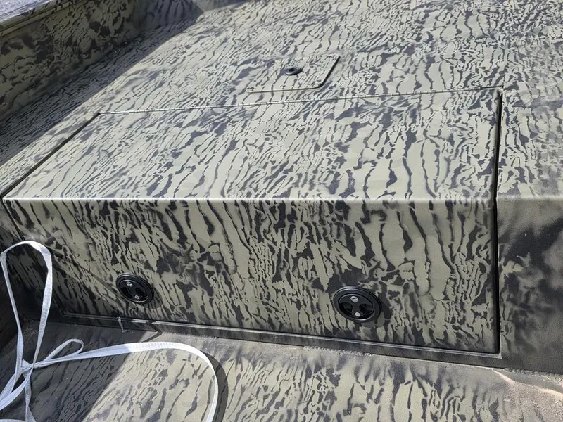 Slide: The Image of 2026 Tracker Grizzly® 1650 T Prairie Wings Edition boat with camouflage pattern detail. - 18