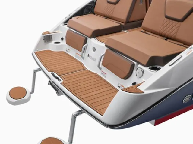 Slide: The Image of 2025 Yamaha Boats 252SD swim platform with tan seating and teak-style flooring. - 33