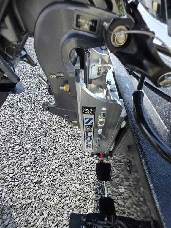 Slide: The Image of Close-up of 2026 Xpress H20C boat motor mount with Pro-Hi Jacker Z-Lock system. - 18