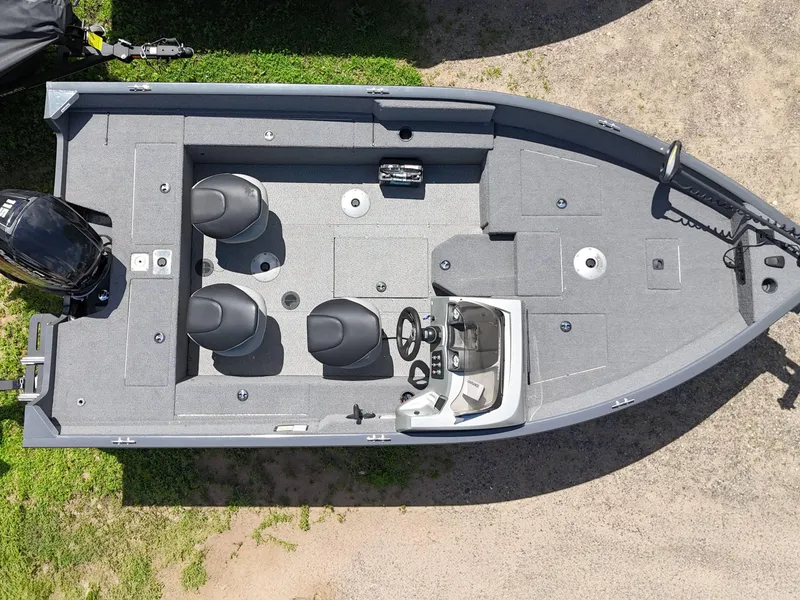 Slide: The Image of 2018 Tracker Pro Guide V-175 SC boat interior with steering console and seating. - 12