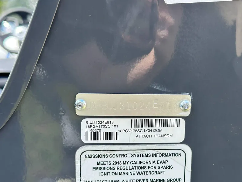 Slide: The Image of 2018 Tracker Pro Guide V-175 SC boat interior with windshield and storage compartments. - 17