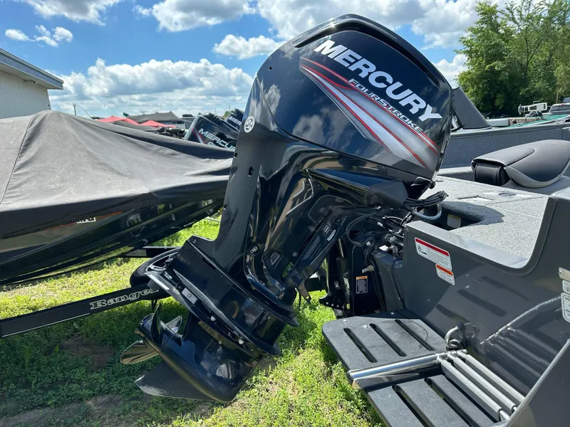 Slide: The Image of 2018 Tracker Pro Guide V-175 SC fishing boat on trailer, featuring Mercury outboard motor. - 4