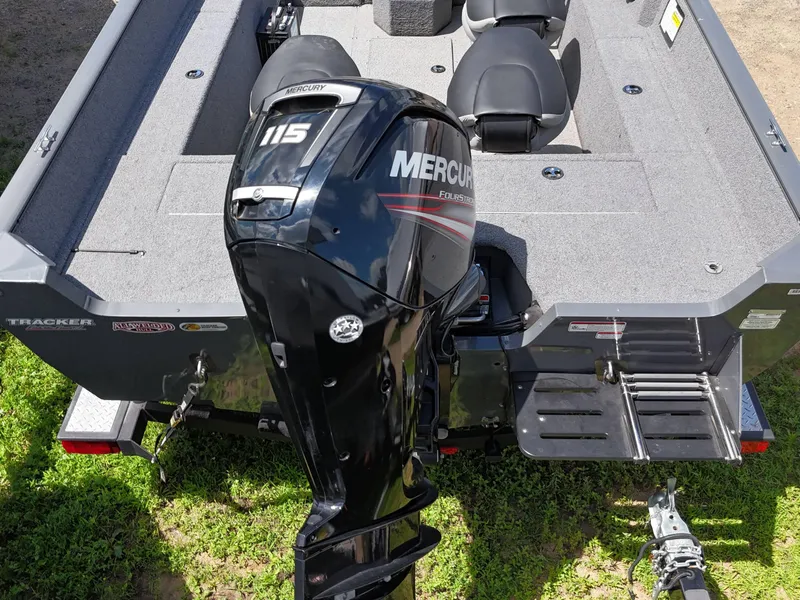 Slide: The Image of 2018 Tracker Pro Guide V-175 SC boat on trailer, featuring all-welded hull design. - 8