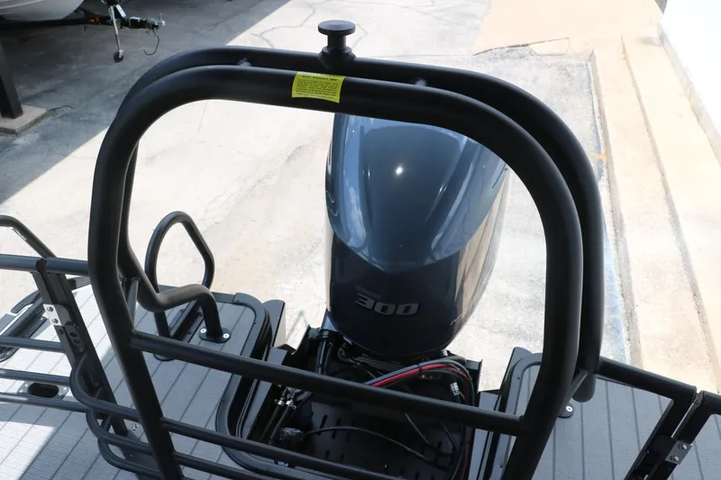 Slide: The Image of Rear view of 2026 Sylvan G3 DLZ Bar boat with powerful 300 horsepower engine. - 20