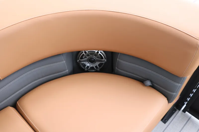 Slide: The Image of 2026 Sylvan G3 DLZ Bar boat seating with integrated speaker, tan and gray upholstery. - 35