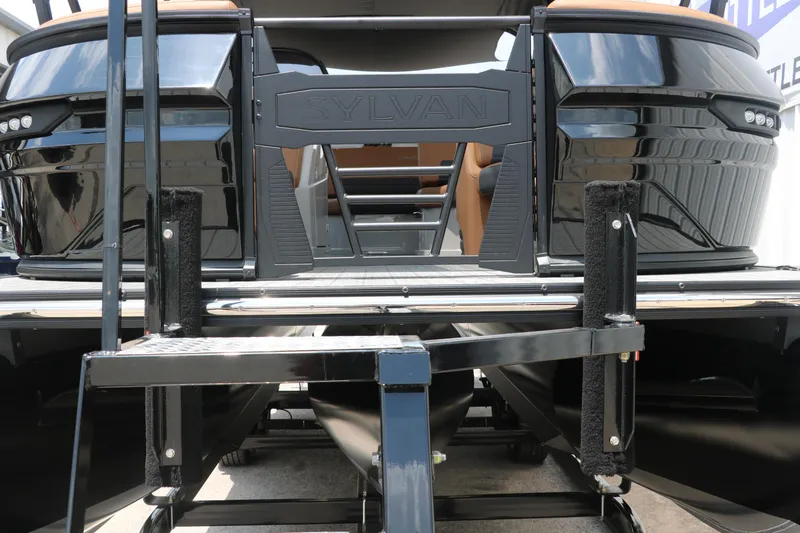 Slide: The Image of 2026 Sylvan G3 DLZ Bar pontoon boat with sleek black design and modern features. - 8