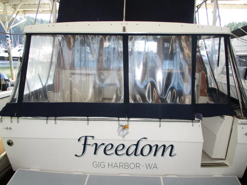 Slide: The Image of 1989 Bayliner 3888 boat named "Freedom" docked at Gig Harbor, WA. - 12