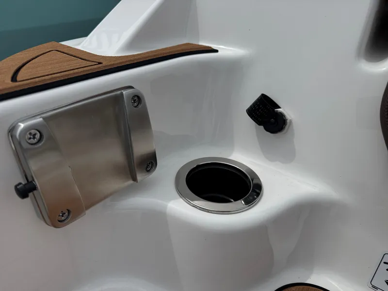 Slide: The Image of Yamaha Boats 252SD 2025 model, featuring a sleek cup holder and stainless steel fixture. - 4