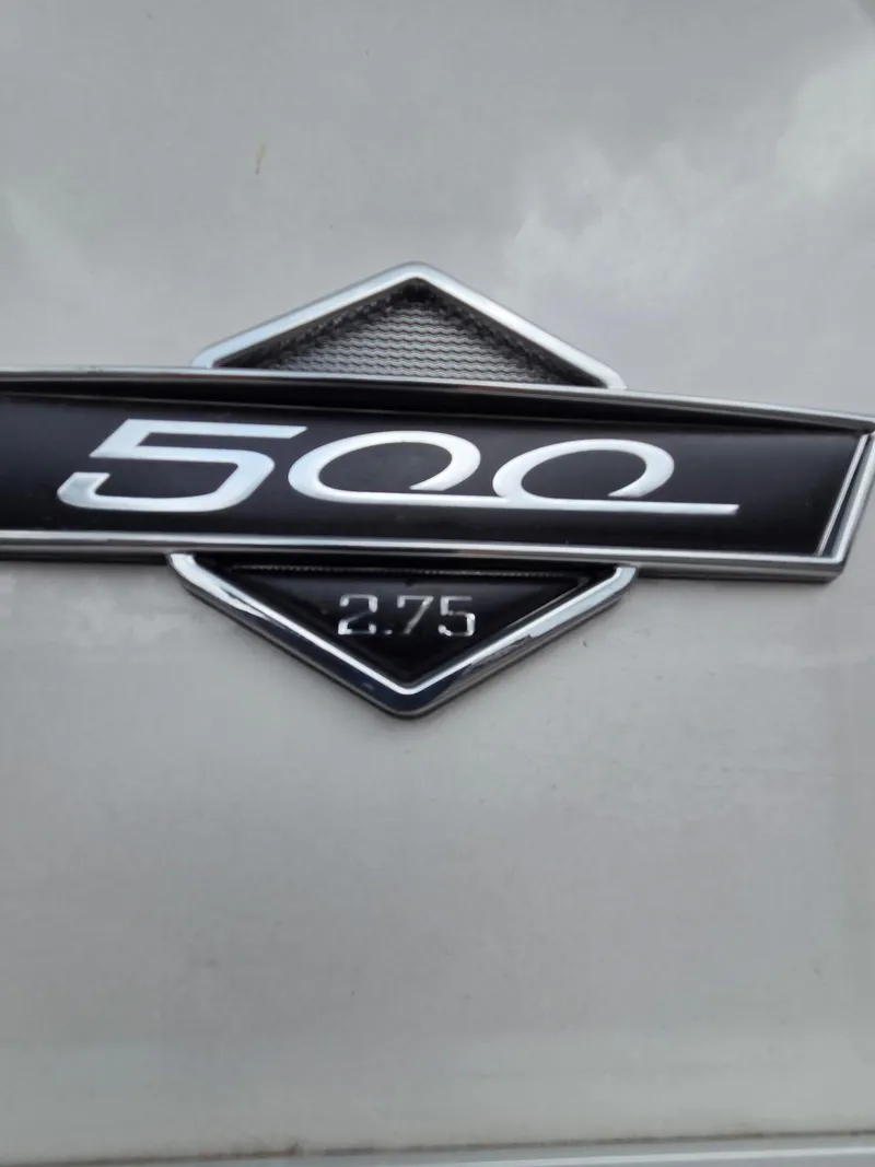 Slide: The Image of South Bay 523 CR 2017 emblem with '500 2.75' badge on a gray surface. - 10