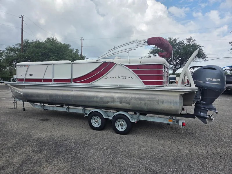 Slide: The Image of 2017 South Bay 523 CR pontoon boat with Yamaha outboard motor on trailer. - 4