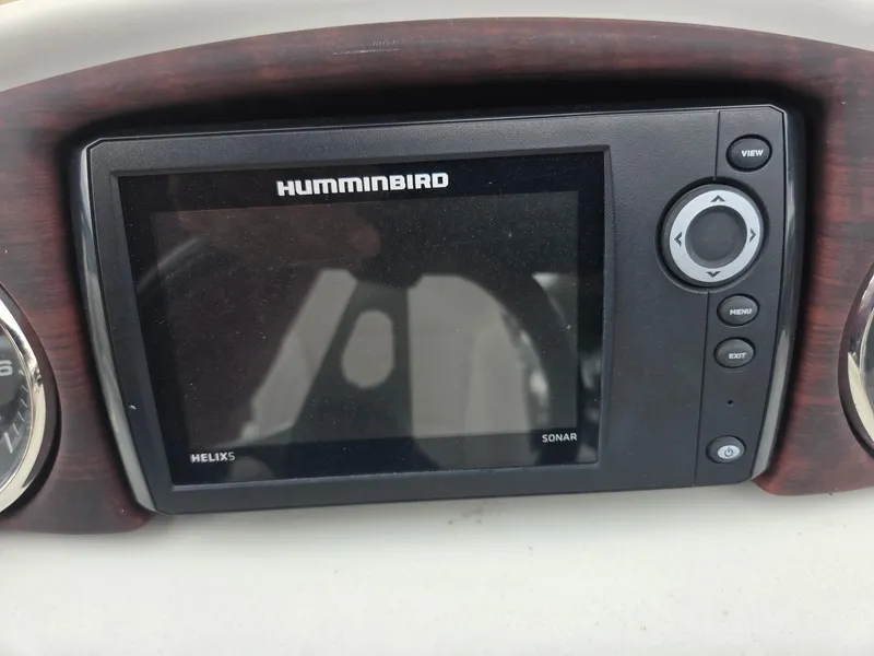 Slide: The Image of Humminbird Helix 5 sonar display on 2017 South Bay 523 CR boat dashboard. - 6