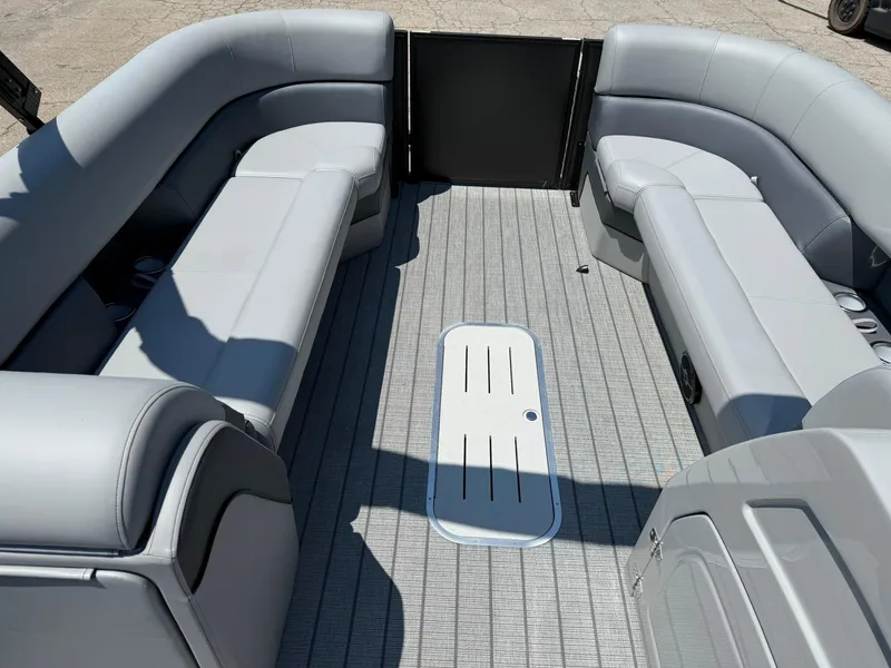 Slide: The Image of 2026 Bentley Pontoons Elite 253 Swingback interior with spacious seating and sleek design. - 11