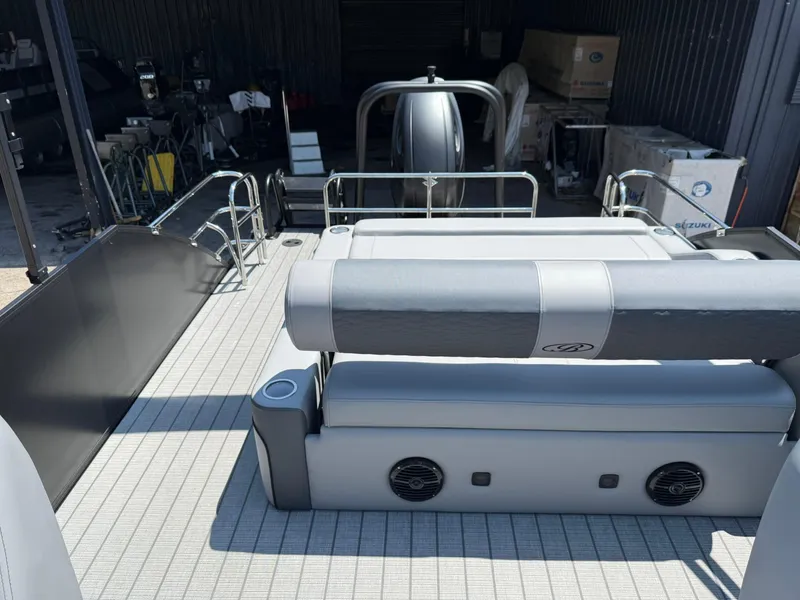 Slide: The Image of 2026 Bentley Pontoons Elite 253 Swingback interior with sleek seating and modern design. - 13