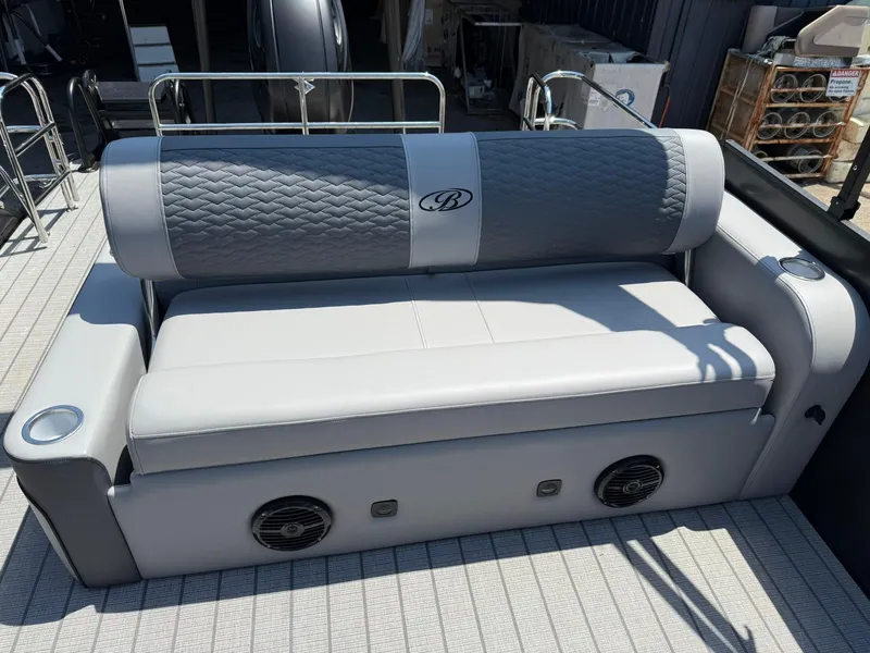 Slide: The Image of 2026 Bentley Pontoons Elite 253 Swingback seating with quilted upholstery and integrated speakers. - 9