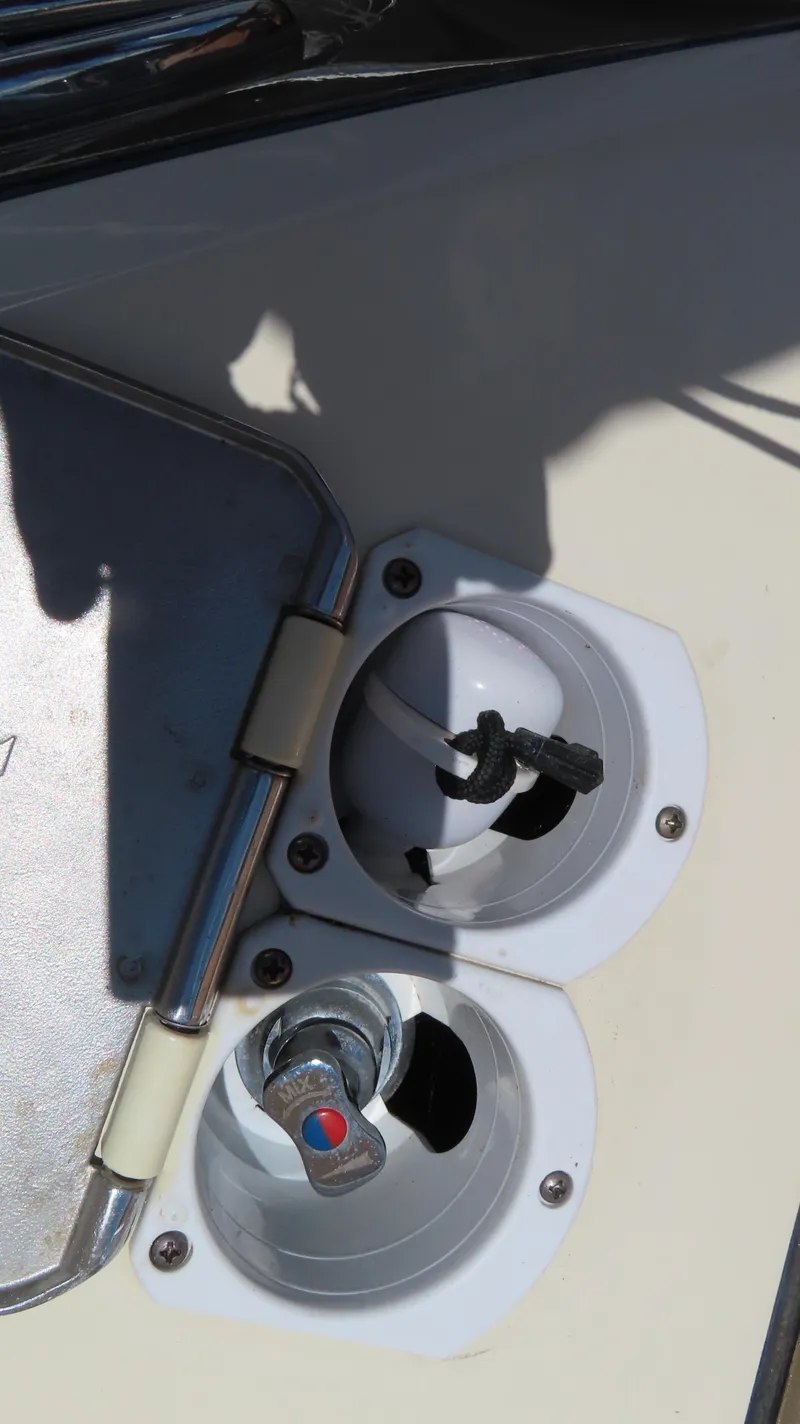 Slide: The Image of Fuel and water caps on a 2018 Chris-Craft Launch 34 boat. - 12