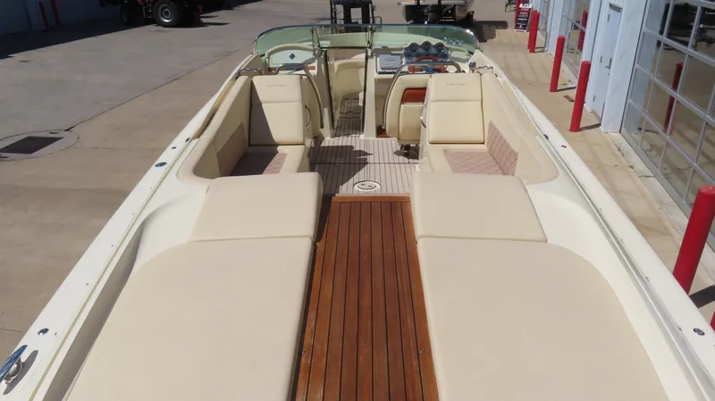 Slide: The Image of 2018 Chris-Craft Launch 34 boat with spacious seating and elegant wood deck. - 14