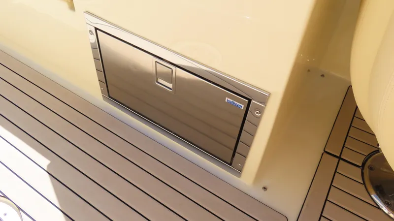 Slide: The Image of 2018 Chris-Craft Launch 34 boat interior with stainless steel storage compartment. - 25