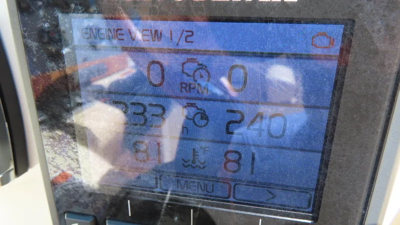 Slide: The Image of Close-up of a 2018 Chris-Craft Launch 34 engine display showing RPM and temperature. - 29