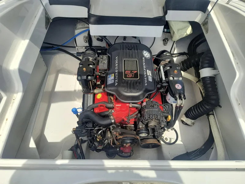 Slide: The Image of 2007 Four Winns 240 Horizon boat engine compartment with Volvo Penta 5.7 Gi engine. - 13