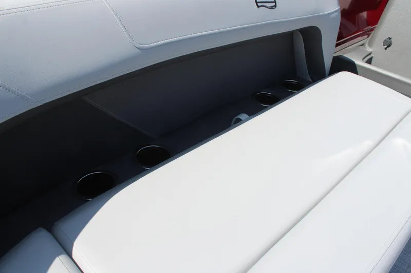 Slide: The Image of 2026 Sun Tracker Party Barge 16 DLX interior seating with cup holders. - 20