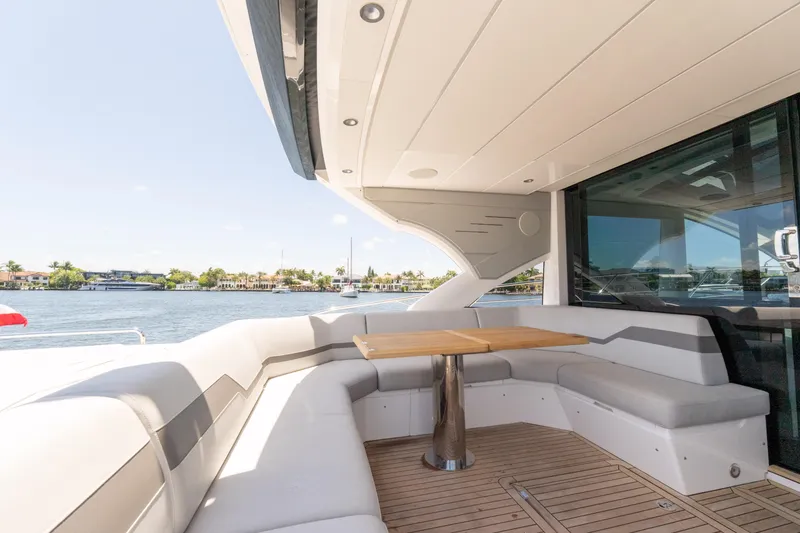 Slide: The Image of Luxurious Sunseeker Predator 60 yacht deck with seating area, 2022 model. - 22