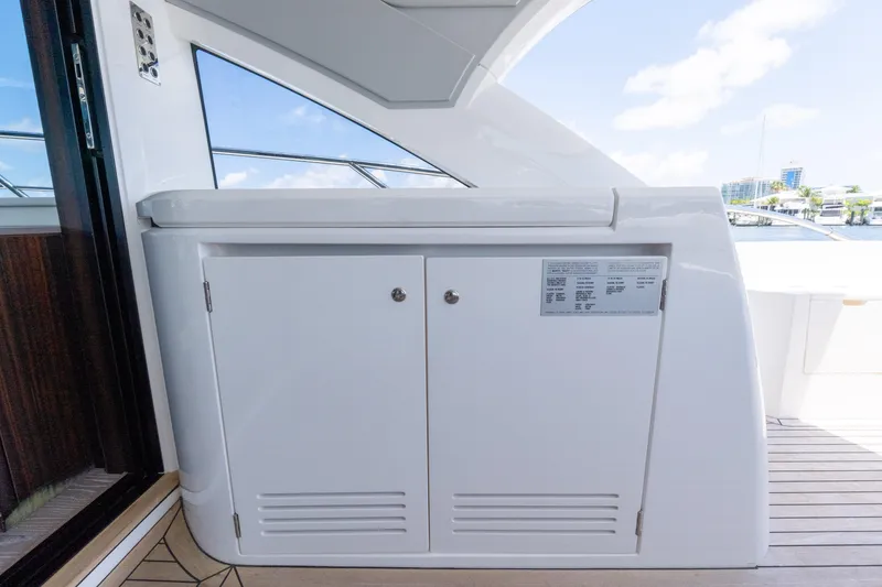 Slide: The Image of Sunseeker Predator 60 yacht interior detail, 2022 model, featuring sleek cabinetry and modern design. - 24