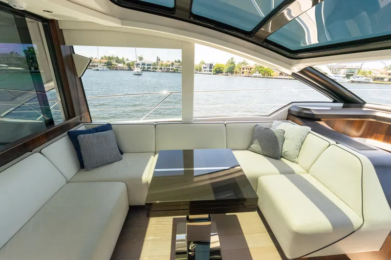 Slide: The Image of Luxurious Sunseeker Predator 60 yacht interior with waterfront view, 2022 model. - 32