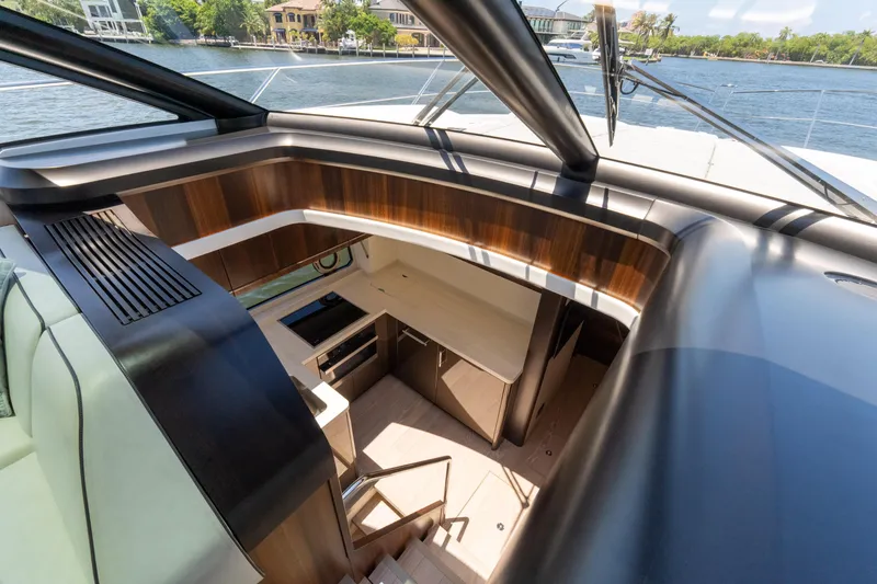 Slide: The Image of Interior view of 2022 Sunseeker Predator 60 yacht, showcasing modern design and luxurious finishes. - 40