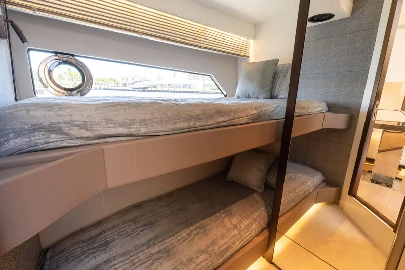 Slide: The Image of Interior of 2022 Sunseeker Predator 60 yacht with cozy bunk beds and modern design. - 49