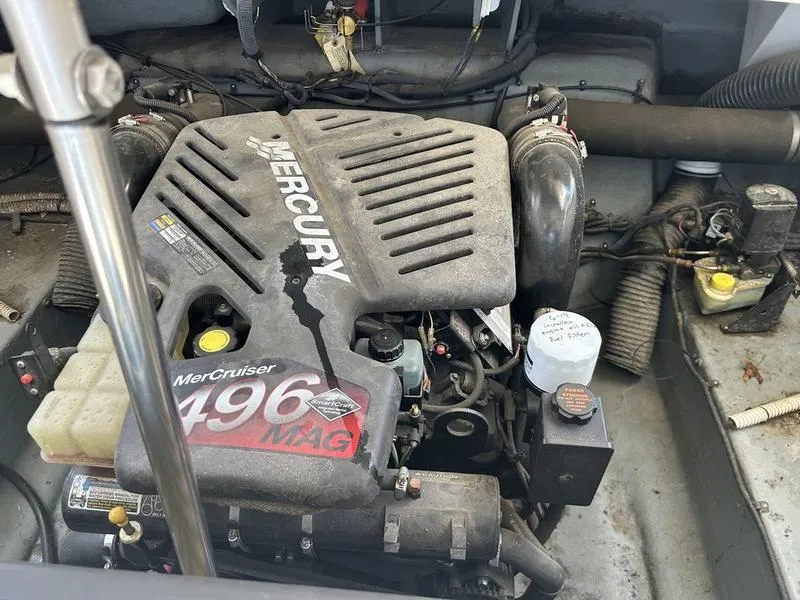 Slide: The Image of MerCruiser 496 MAG engine in a 2002 Sea Ray 290 boat. - 14